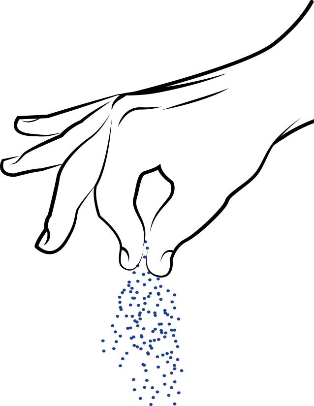 hand sprinkling popcorn seasoning